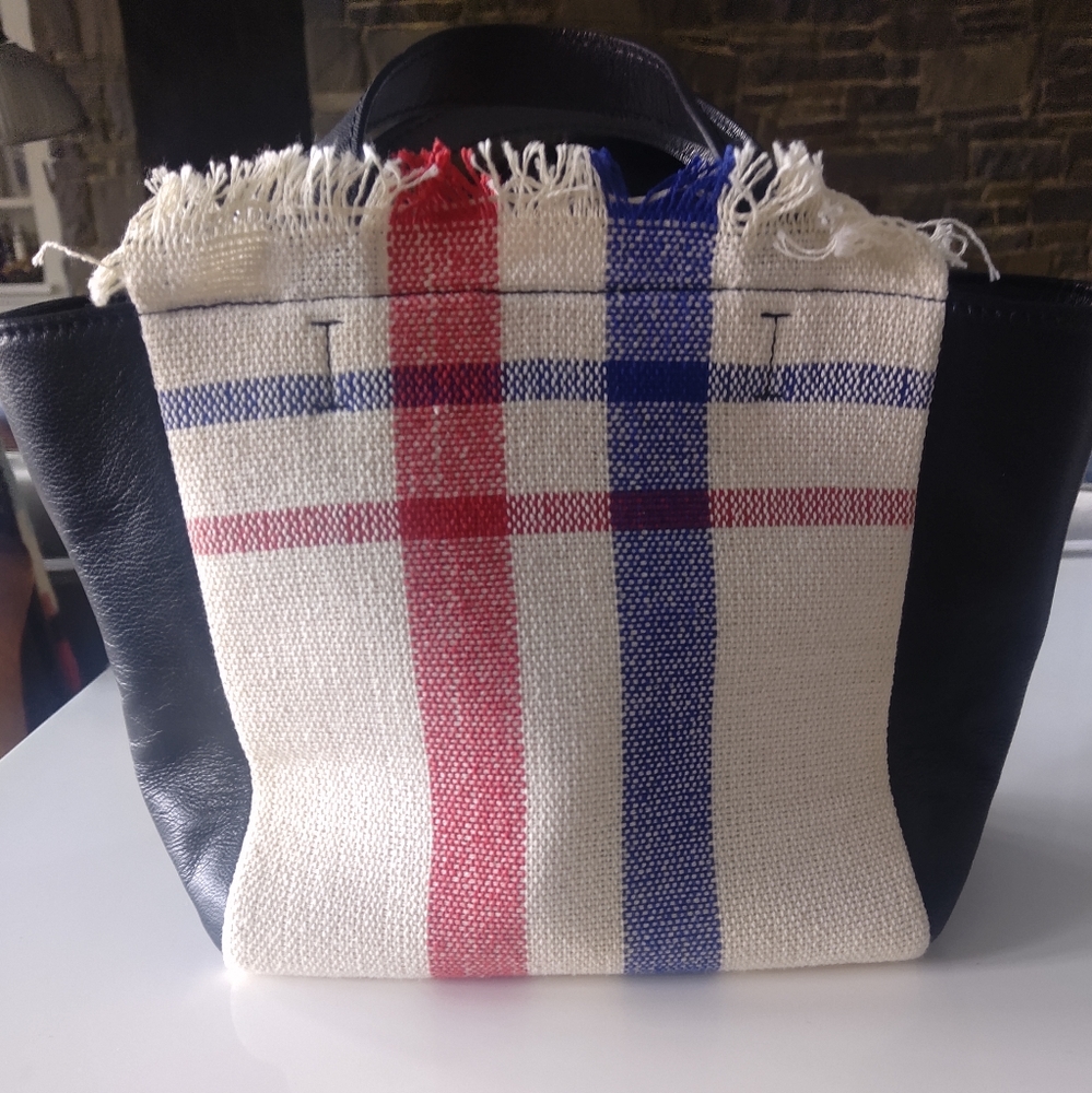 Barneys New York navy purse with red/white/blue plaid. Perfect for summer!